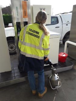 Trading Standards officer at a petrol pump