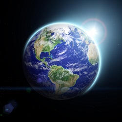 Planet Earth with light from a star creating a halo