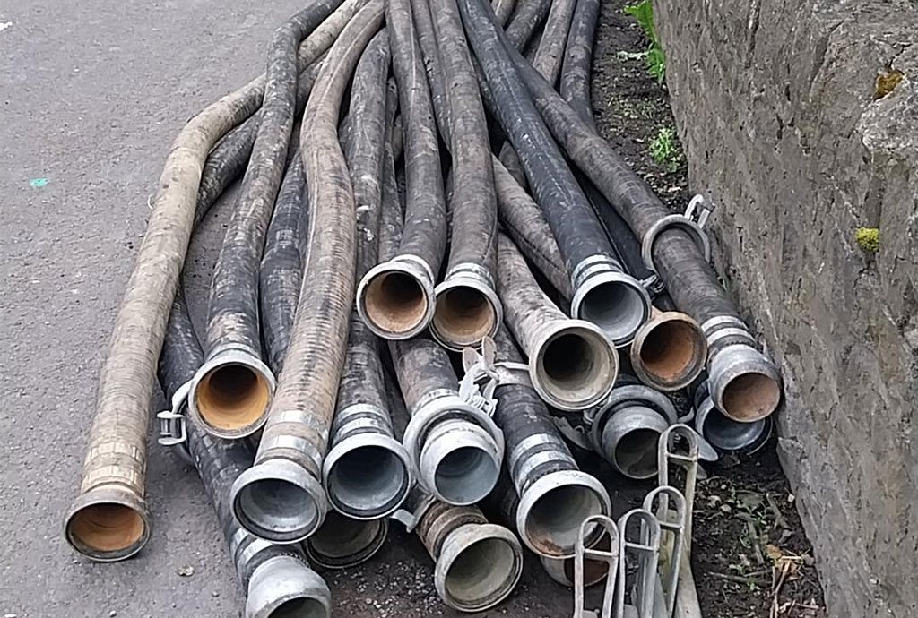 Some of the piping delivered to carry the water from the brook