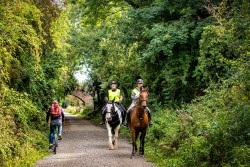 Cyclist and horse riders on the Clowne Greenway